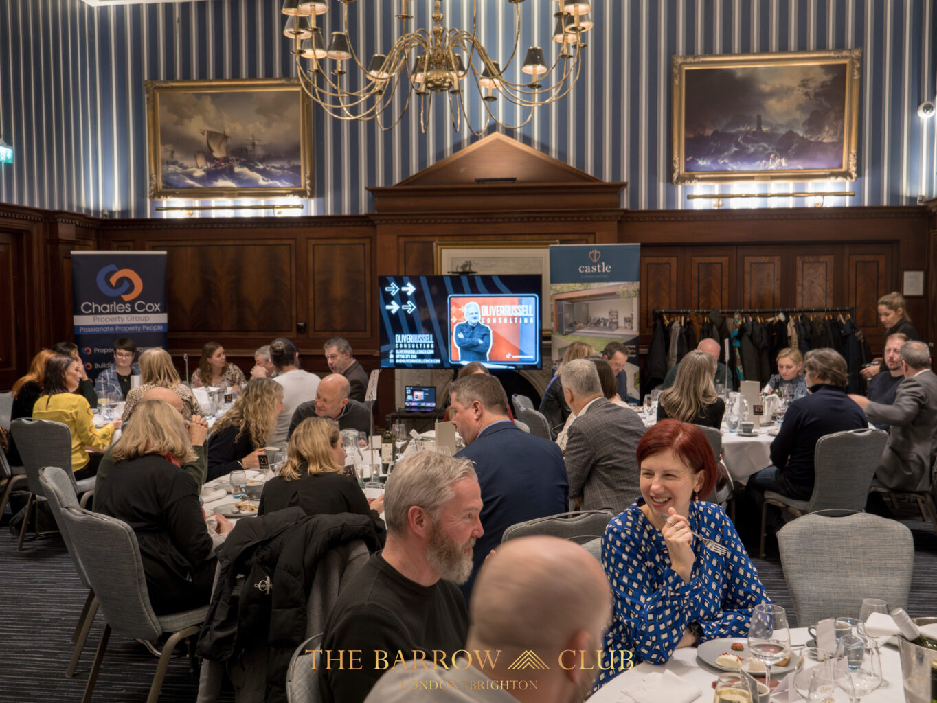 Attendees enjoying dinner at the Barrow Club, Brighton. 